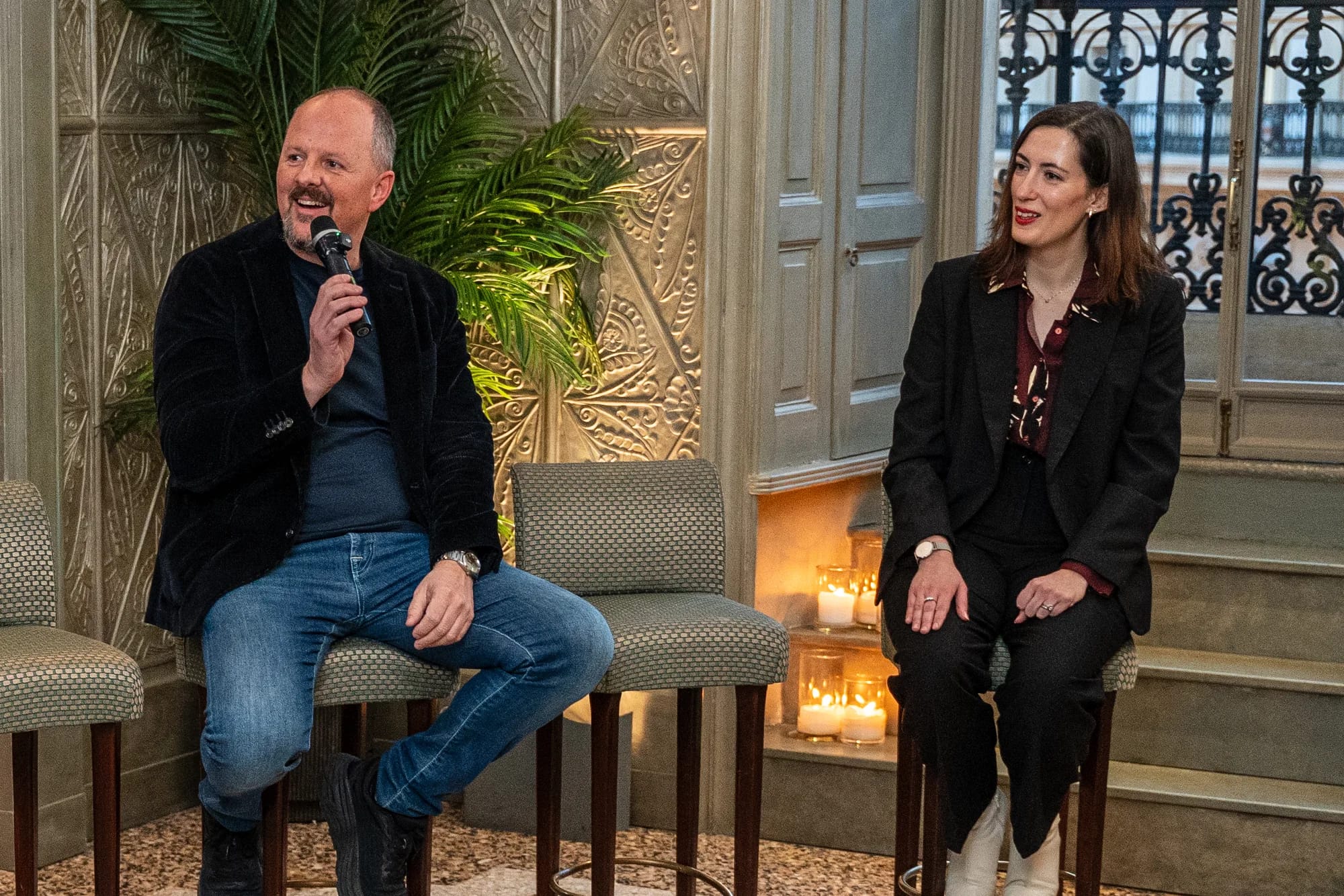 Two panelists on stools during the Tannico and Artemest replatforming roundtable