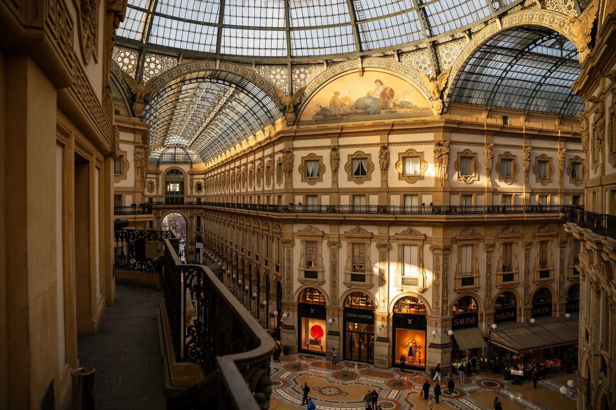View from a balcony over the shops and mosaic floor of Galleria Vittorio Emanuele II
